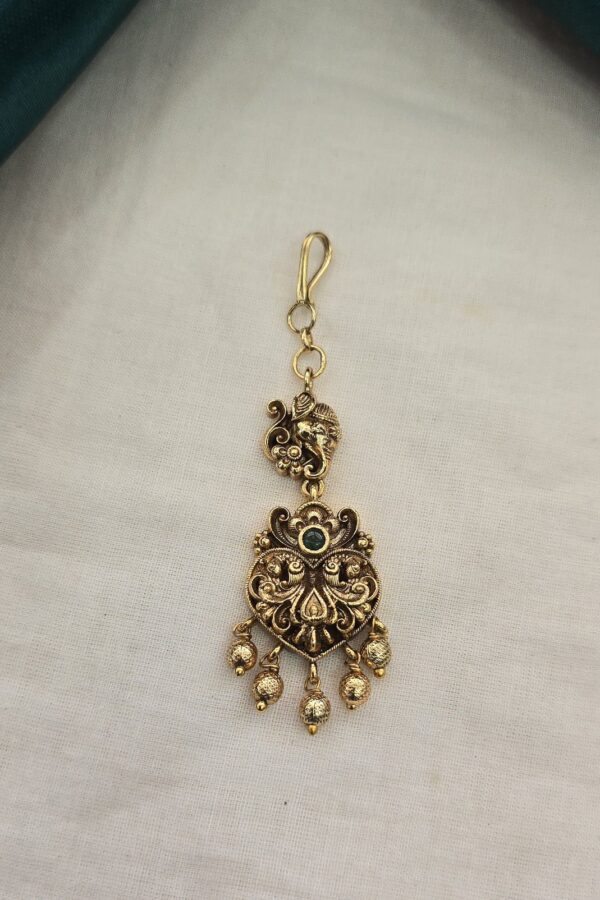 Antique peacock design tika