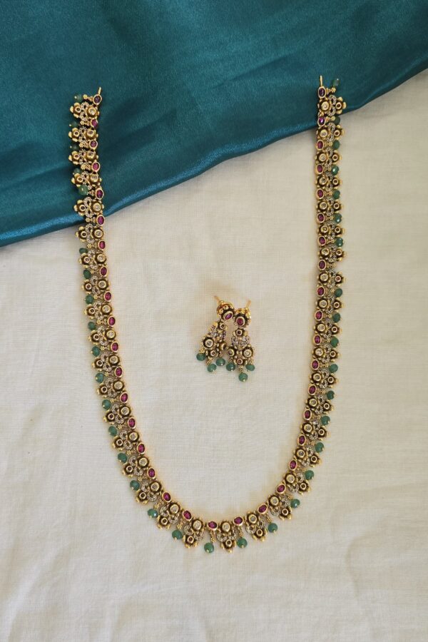 Antique long haram with green beads & back chain