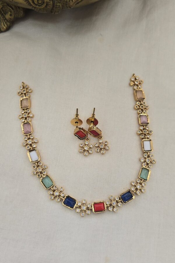 simple multi stone neckset with back chain