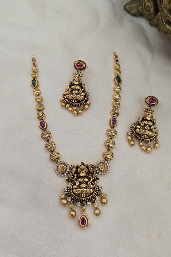 Beautiful gold replica antique neckset with back chain