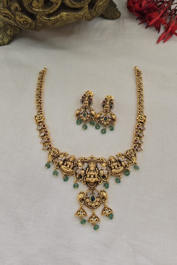 Gold replica antique set with back chain