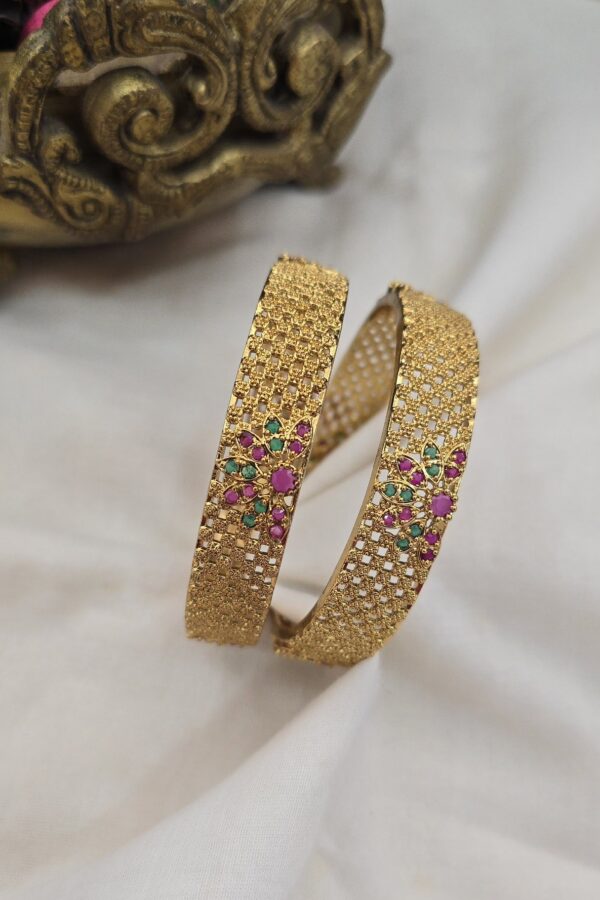 Gold replica bangle